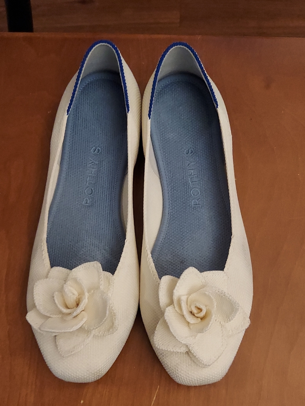 Rothy's Cream Ballet Flats with Rose Applique and Blue Insole Trim